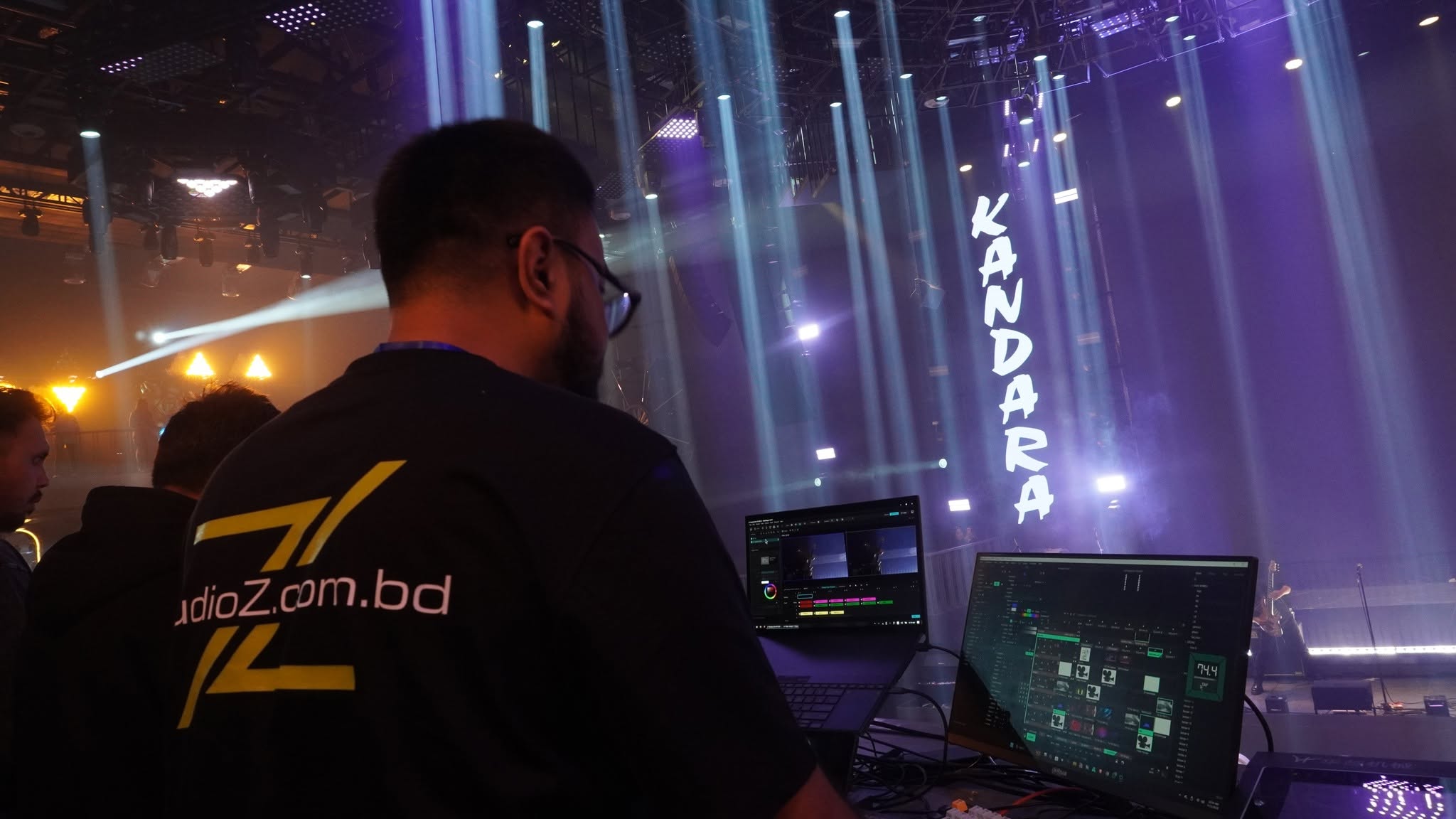 Studio Z crew coordinating multiple technical departments from the control panel during a live production