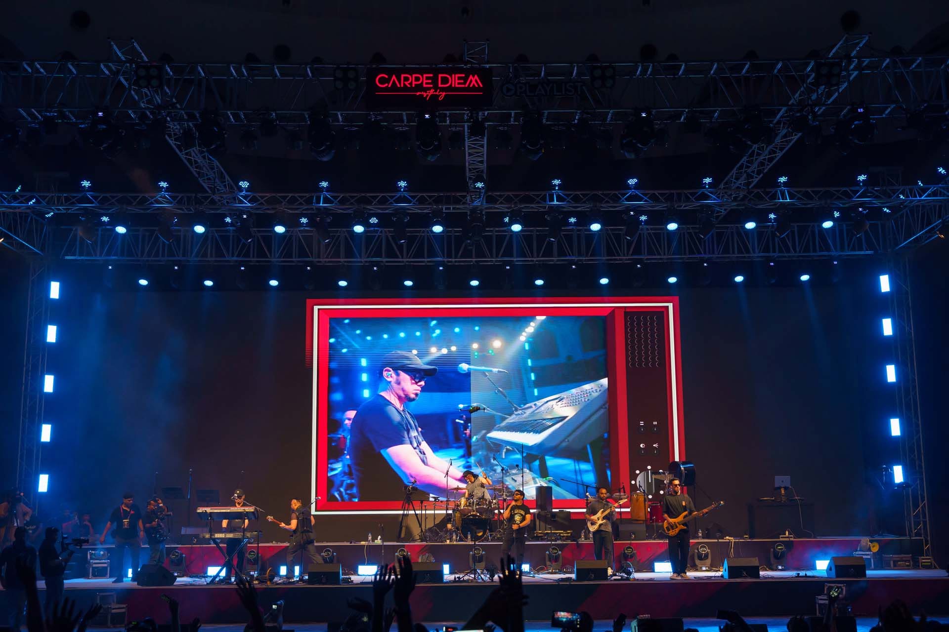 Wide auditorium stage view showing LED, lighting and audience geometry at a Studio Z directed production in Dhaka